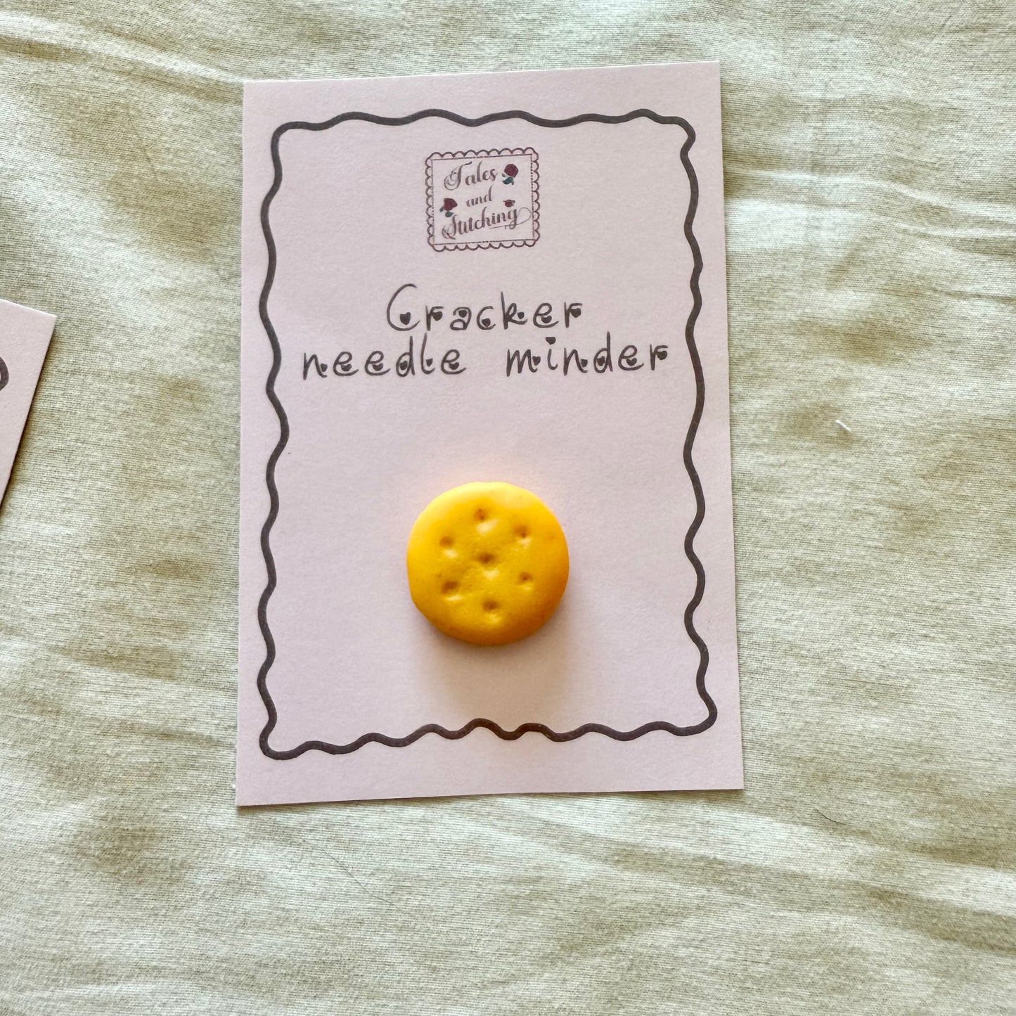 Assorted cracker needle minder
