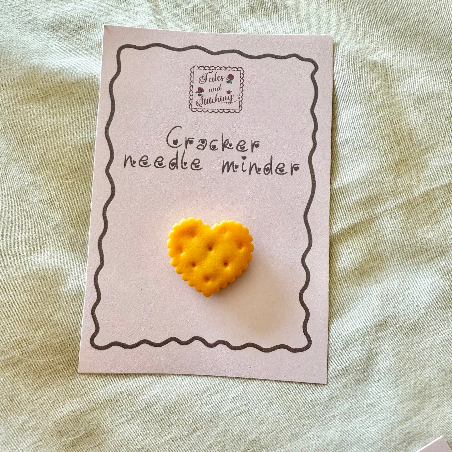 Assorted cracker needle minder