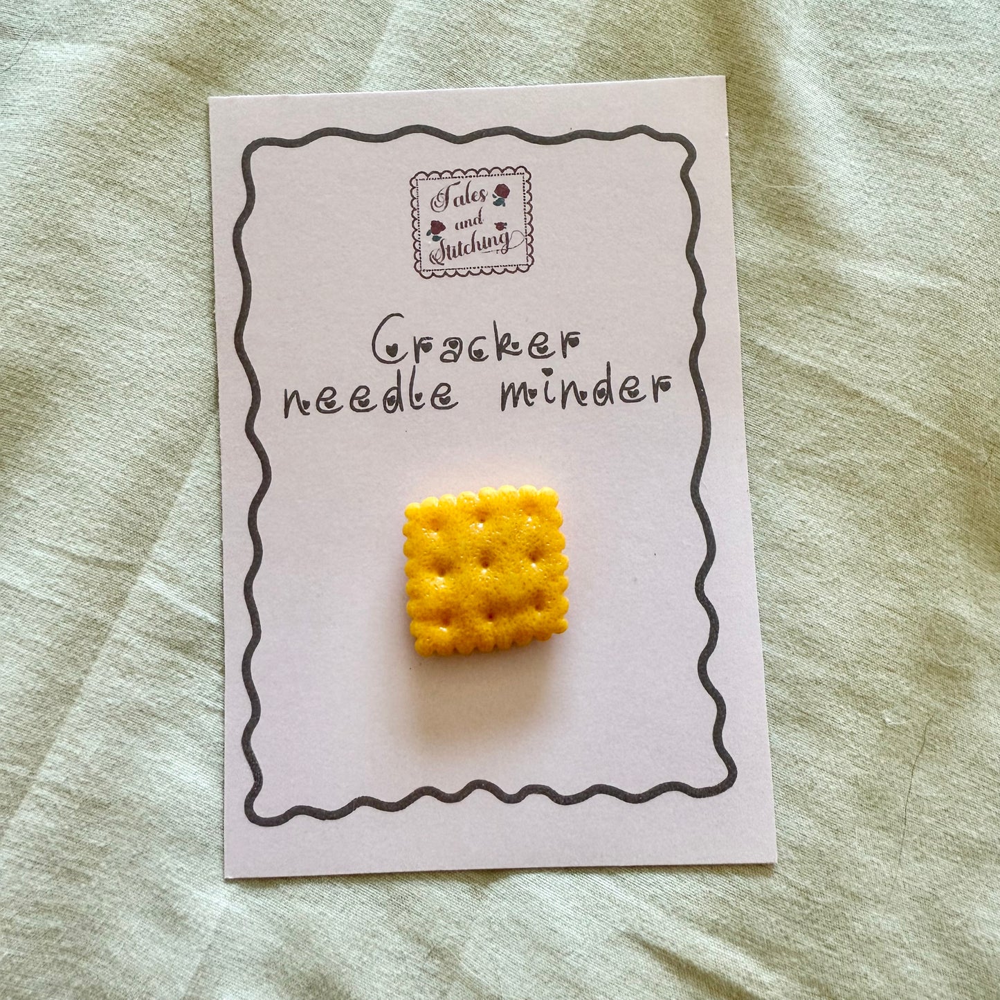 Assorted cracker needle minder