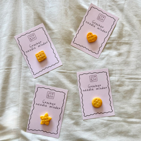 Assorted cracker needle minder