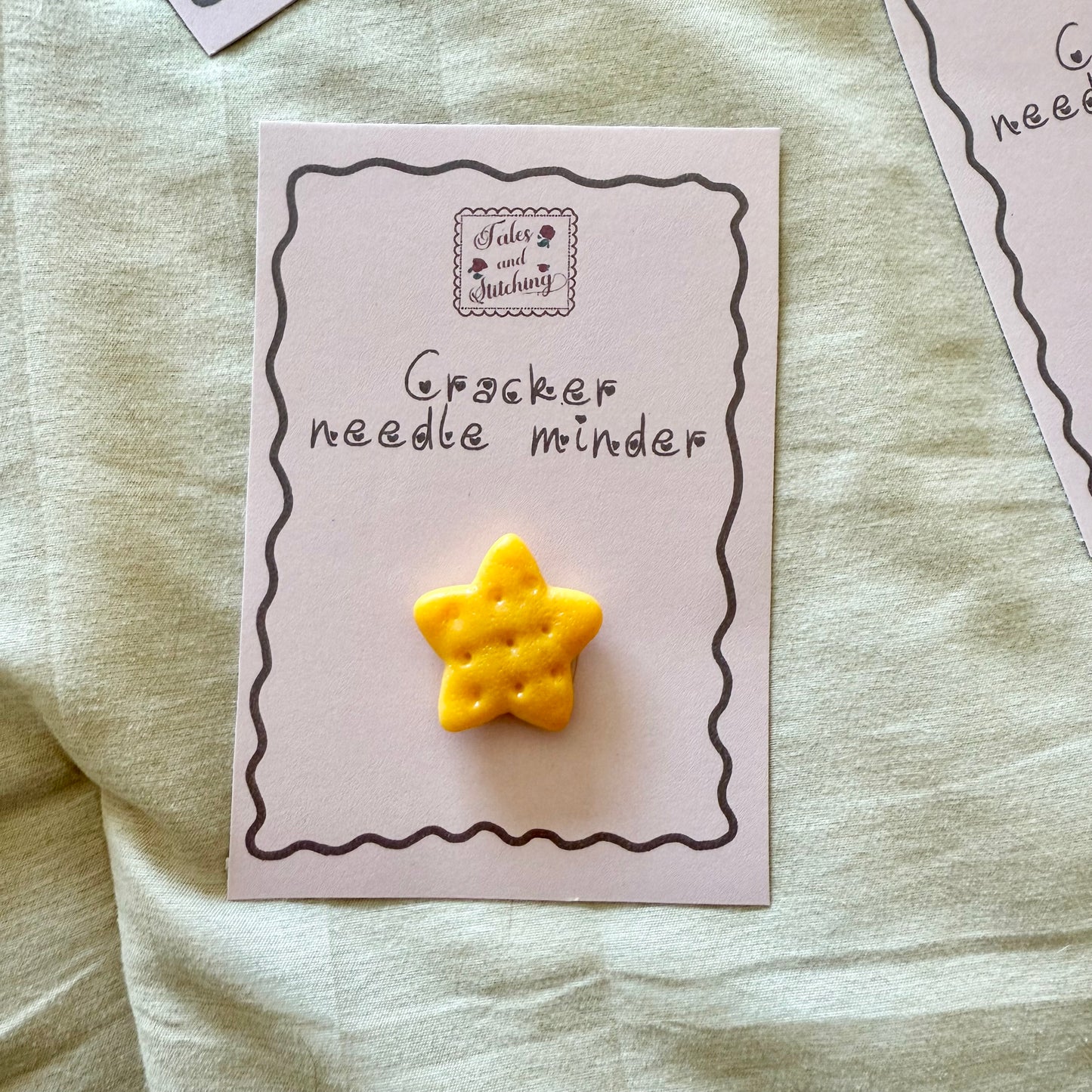 Assorted cracker needle minder